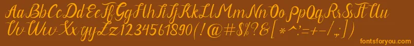 Neguhetty-Schriftart – Orangefarbene Schriften auf braunem Hintergrund