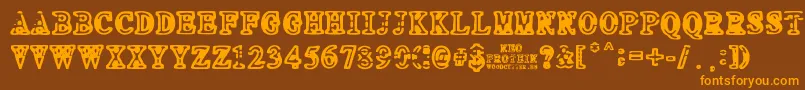 フォントNEO PROTEIN – オレンジ色の文字が茶色の背景にあります。