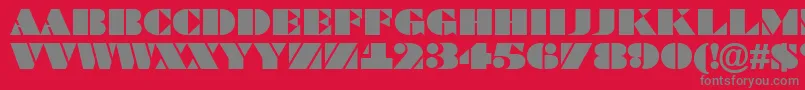 Fonte ABraggatitul – fontes cinzas em um fundo vermelho