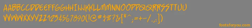 フォントStraightjacketbbReg – オレンジの文字は灰色の背景にあります。