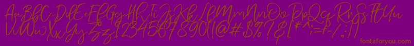 NermolaScript Regular Font – Brown Fonts on Purple Background