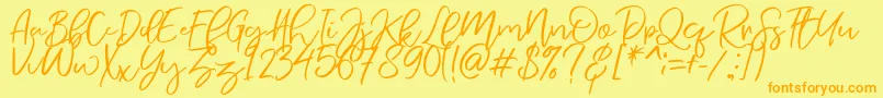 Шрифт NermolaScript Regular – оранжевые шрифты на жёлтом фоне