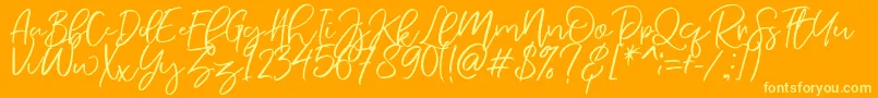 NermolaScript Regular Font – Yellow Fonts on Orange Background