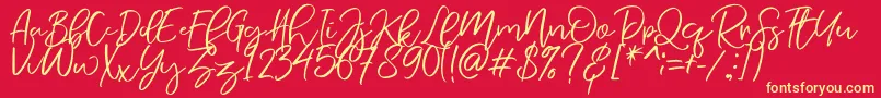 NermolaScript Regular-Schriftart – Gelbe Schriften auf rotem Hintergrund
