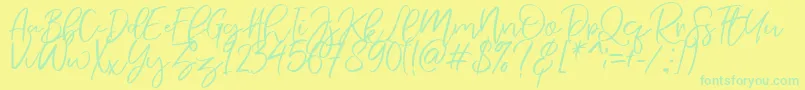 NermolaScript Regular Font – Green Fonts on Yellow Background