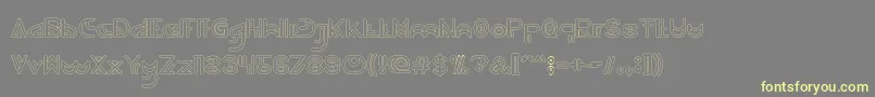 Шрифт NEVER ENDING MAZE Hollow – жёлтые шрифты на сером фоне