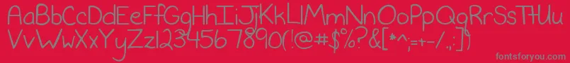 NeverSayNever-Schriftart – Graue Schriften auf rotem Hintergrund