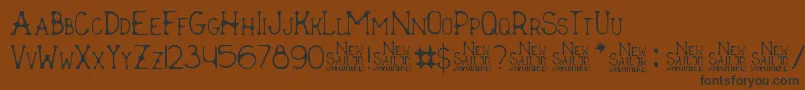 Weitere Informationen zur New Sailor-Schriftart New Sailor-Schriftart – Schwarze Schriften auf braunem Hintergrund