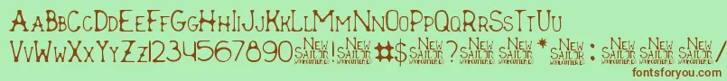 フォントNew Sailor – 緑の背景に茶色のフォント