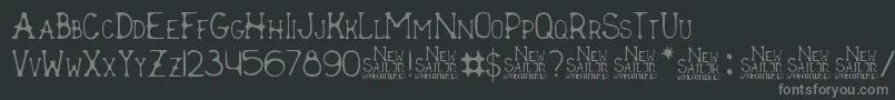 New Sailor-Schriftart – Graue Schriften auf schwarzem Hintergrund