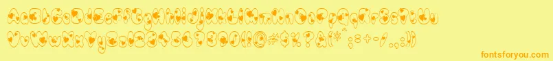 フォントNewlywed – オレンジの文字が黄色の背景にあります。