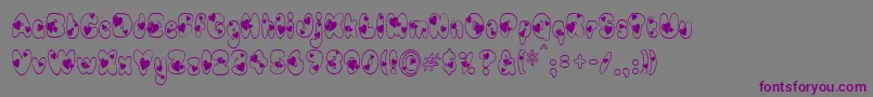 Шрифт Newlywed – фиолетовые шрифты на сером фоне