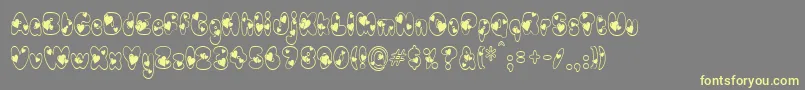 Newlywed Font – Yellow Fonts on Gray Background