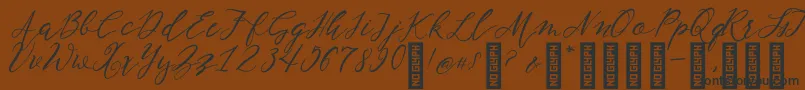 NF Lukara Regular Font – Black Fonts on Brown Background