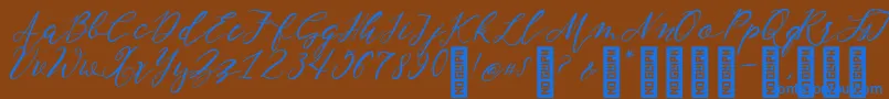 NF Lukara Regular-Schriftart – Blaue Schriften auf braunem Hintergrund