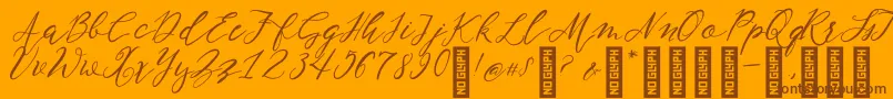 NF Lukara Regular-fontti – ruskeat fontit oranssilla taustalla