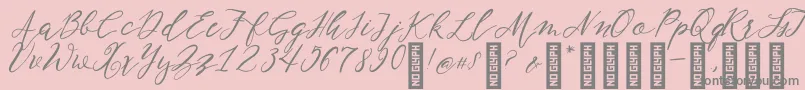 NF Lukara Regular-fontti – harmaat kirjasimet vaaleanpunaisella taustalla