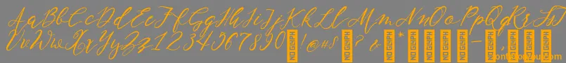NF Lukara Regular-Schriftart – Orangefarbene Schriften auf grauem Hintergrund