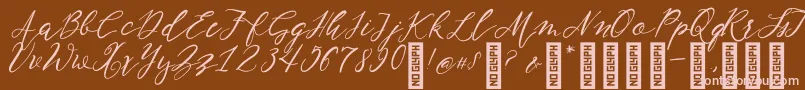 NF Lukara Regular-fontti – vaaleanpunaiset fontit ruskealla taustalla