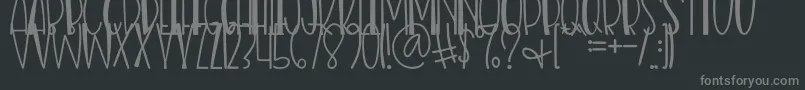 Nias Bird Font – Gray Fonts on Black Background
