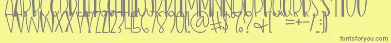 Nias Bird Font – Gray Fonts on Yellow Background