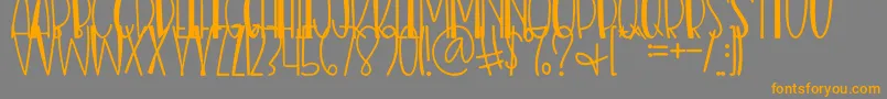 Nias Bird Font – Orange Fonts on Gray Background