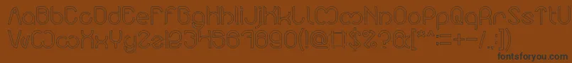 Nicole Hollow Font – Black Fonts on Brown Background