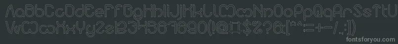 Nicole Hollow-fontti – harmaat kirjasimet mustalla taustalla
