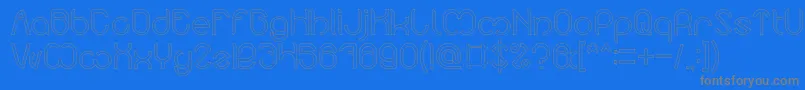 Nicole Hollow Font – Gray Fonts on Blue Background