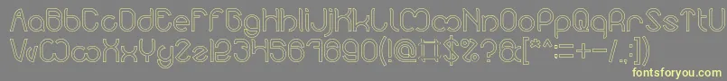 Nicole Hollow-fontti – keltaiset fontit harmaalla taustalla