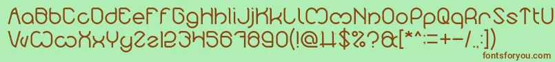 Шрифт Nicole Light – коричневые шрифты на зелёном фоне