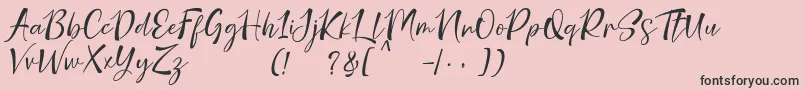 nicolette demo-fontti – mustat fontit vaaleanpunaisella taustalla