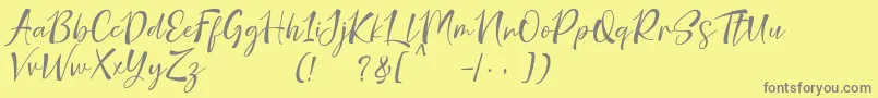 nicolette demo-Schriftart – Graue Schriften auf gelbem Hintergrund