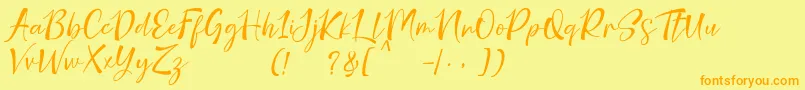 フォントnicolette demo – オレンジの文字が黄色の背景にあります。