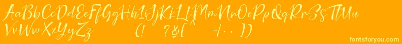 nicolette demo-Schriftart – Gelbe Schriften auf orangefarbenem Hintergrund