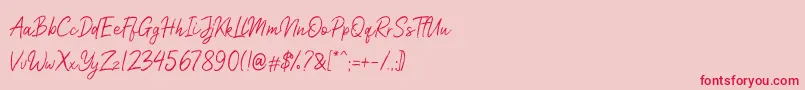 Nicollast Demo Font – Red Fonts on Pink Background