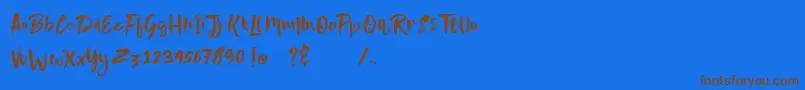 フォントnightype – 茶色の文字が青い背景にあります。