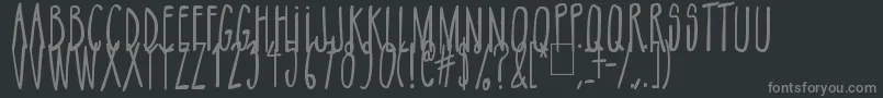 NikoFont Up-fontti – harmaat kirjasimet mustalla taustalla