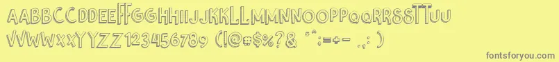 フォントNikolas  Pine – 黄色の背景に灰色の文字