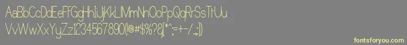 Шрифт CastorgateUpright – жёлтые шрифты на сером фоне
