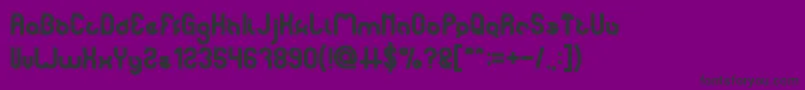 noakatz Bold-fontti – mustat fontit violetilla taustalla