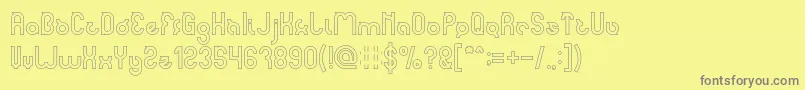 noakatz Hollow-fontti – harmaat kirjasimet keltaisella taustalla