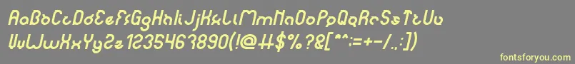 noakatz Italic-fontti – keltaiset fontit harmaalla taustalla