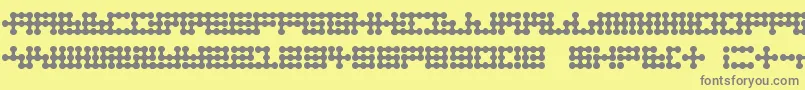 Node To Nowhere-fontti – harmaat kirjasimet keltaisella taustalla