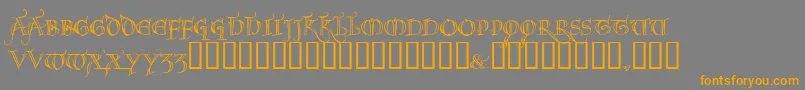 フォントNOEL     – オレンジの文字は灰色の背景にあります。
