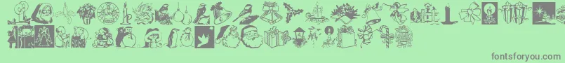 Fonte noel dingbats – fontes cinzas em um fundo verde