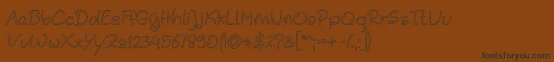 Noela Sherly Outline-fontti – mustat fontit ruskealla taustalla