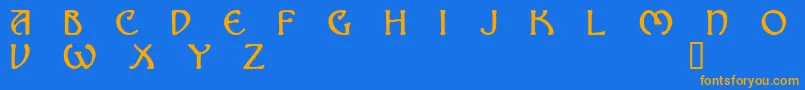 フォントNOMAD    – オレンジ色の文字が青い背景にあります。