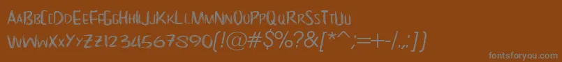 NoScary regular Font – Gray Fonts on Brown Background