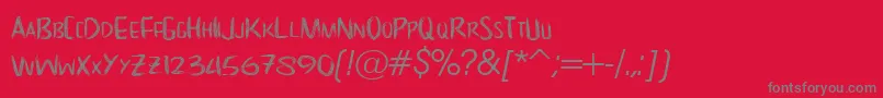 NoScary regular-Schriftart – Graue Schriften auf rotem Hintergrund